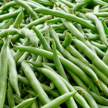 A close-up image of fresh green beans, showing their vibrant green color and characteristic shape.