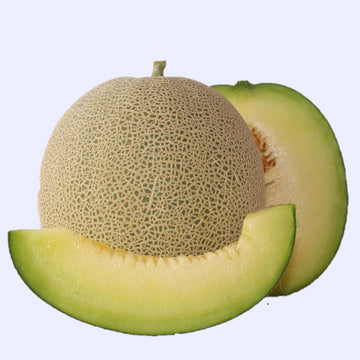 An image showing a whole Rocky Ford green flesh melon alongside a slice of the same melon, isolated on a white background.